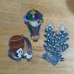 Set of stained glass hangings.